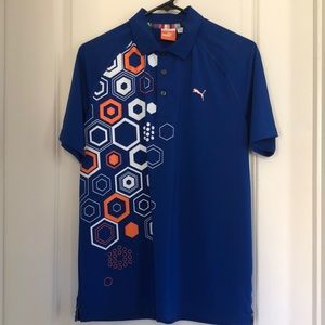 Men’s Puma golf polo in Small dark blue/orange
